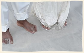 Toes in the sand wedding couple Virgin Islands Beach wedding.