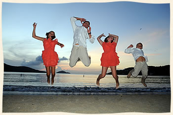 Magens Beach wedding party jumping for joy.  St. Thomas USVI