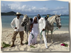 Wedding couple with horses and ranch handler at Lindquist Beach.