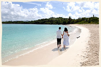wedding couple walking Lindquist Beach at Smith Bay Park St Thomas US Virgin Islands