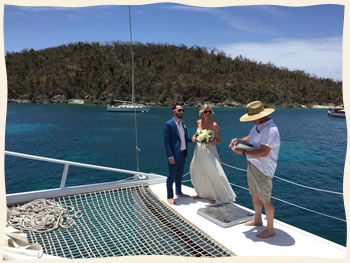 Married on bow of sailboat Virgin Islands