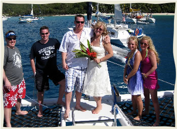 Bride and Groom getting married on sailboat in the US Virgin Islands